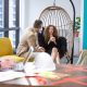 Group of diversity businesspeople discussing at couch in the office. man and woman enjoy talking at co-working space. brainstorming business, sharing story or small talk.