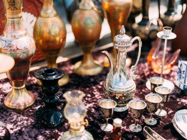 Metal Oriental Jug With Engraved Texture Floral Pattern. Oriental Style Ancient Jug At Flea Market. East Tableware. Old Tableware For Cofe And Tea.Metal Oriental Jug With Engraved Texture Floral Pattern. Oriental Style Ancient Jug At Flea Market. East Tableware. Old Tableware For Cofe And Tea.